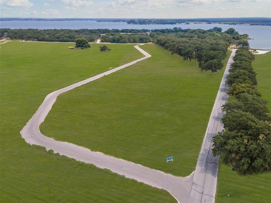 Discover Lot 8 at Waterfront on Park — a rare 3-acre homesite in an exclusive community on the tranquil, south-facing shores of Eagle Mountain Lake. Once a beloved city park, this private enclave now features just 16 premium lots with direct lake access, for swimming, boating and fishing, and breathtaking water views. Enjoy the serenity of lakeside living just minutes from vibrant downtown Fort Worth. This is your opportunity to create a custom retreat in a setting where nature, privacy, and convenience converge.