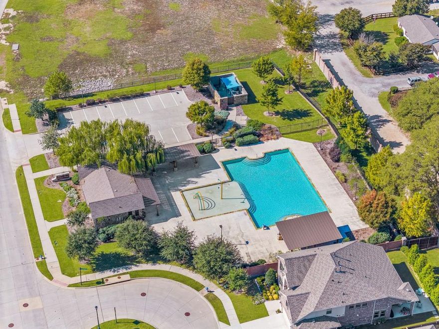 Just in time for Christmas, gift yourself with this stunning single-story home built in 2018 by First Texas Homes with a customized Sonoma floorplan in the desirable Willow Wood community of McKinney, zoned to award-winning Melissa ISD. This 4-bedroom, 2-bath, 2,508 sq ft home features 11-foot vaulted ceilings, architectural archways, upgraded lighting, and wood-look tile flooring throughout the home. A private home office with glass-pane French doors sits at the front of the home, ideal for work or study. The gourmet kitchen includes quartz countertops, subway tile backsplash, walnut cabinetry with pot drawers, a large island with storage, walk-in pantry, and separate butler’s pantry with glass-front uppers. Frigidaire Gallery stainless appliances include double oven, gas cooktop, and vent hood. The kitchen opens to a spacious living room with natural light and a stone gas fireplace with wood mantel and TV wiring. The oversized primary suite offers vaulted ceiling with crown molding, bay windows, and a spa-like bath with dual vanities, soaking tub nook, walk-in shower with body sprays, private water closet, and large walk-in closet with built-ins. Secondary bedrooms include vaulted ceilings, generous closets, and easy-care tile flooring. Smart home upgrades include Ecobee thermostat, ethernet to every room, HomePro security system, central vacuum, industrial-grade water filtration and softener system, tankless water heater, Wi-Fi booster, and exterior porch camera. Backyard features a covered patio with aviator fan, roller shade, and storage shed that conveys. Oversized 2-car garage offers ceiling storage racks and side entry door. Willow Wood offers a resort-style pool with splash park, basketball court, playground, walking trails, and quick access to Hwy 5, US-75, and 121. Less than a mile from Willow Wood Elementary and minutes from downtown McKinney, retail, dining, and parks.