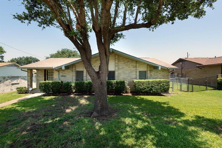 Beautifully updated home ready for you! This spacious property features two large living areas, a generous formal dining space, and a kitchen with a cozy breakfast nook. A large window-style cutout from the kitchen to the formal dining room creates an open, connected feel — perfect for gatherings and entertaining.

The kitchen is equipped with granite countertops, a stainless sink, and a drop-in gas range. Enjoy the warmth of wood floors throughout and a gas fireplace that adds charm and comfort. Offering three bedrooms and two bathrooms, this home provides ample space for family or guests.

The backyard is fully enclosed with a chain-link fence and includes a gated driveway for added convenience. Located just minutes from I-20, commuting is a breeze. Don’t miss this opportunity to own a move-in-ready home in a great location!