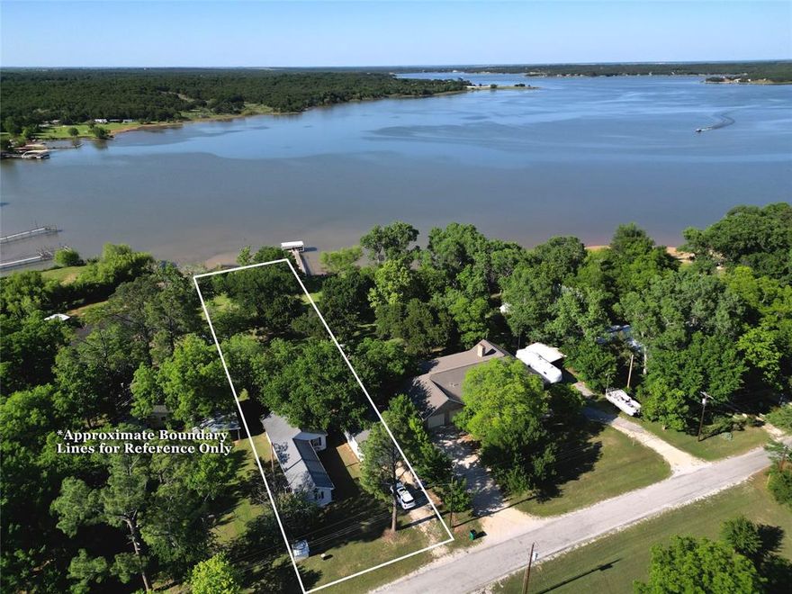 Escape to your peaceful waterfront home on Lake Nocona. This cute 2 bedroom, 2 bath lake house offers stunning water views with direct access to fishing, boating and swimming. This property sits on nearly half an acre, featuring a lush, tree filled lot with a huge backyard that extends straight to the water's edge. This home features a durable metal roof and has been well maintained, offering peace of mind for its next owner. Inside you'll find a cozy layout with comfortably sized bedrooms and 2 full sized bathrooms. Plus, a 25x50 shop provides ample space for hobbies, storage or all your water toys. Perfect for small families, retirees or a relaxing weekend getaway. Enjoy the gentle lake breezes, wildlife and tranquility of lake life. This lake house is true gem in a well established community!