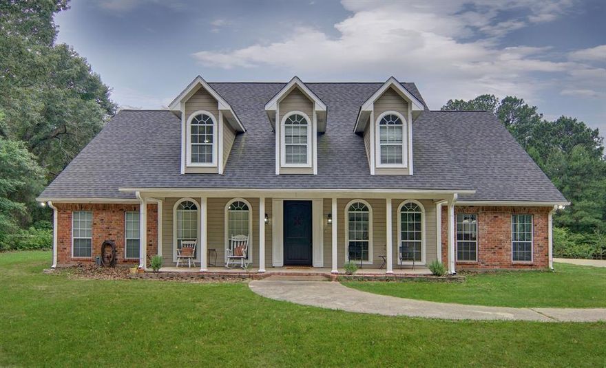 Nestled among the towering pines of Northeast Texas, this 6 Bed, 6.5 Bath is a rare find. Situated on 7 pristine acres, this spacious 4,280 sq ft home offers 6 bedrooms and 6.5 bathrooms, perfect for accommodating large families or hosting guests in comfort and style. The heart of the home is the expansive kitchen, thoughtfully designed with ample storage, granite countertops, a large island, breakfast bar, and stainless-steel appliances. It’s an ideal space for cooking, entertaining, and gathering with loved ones. Each of the six bedrooms features its own private bathroom, offering privacy and convenience for all. The family room is both grand and inviting—spacious enough for large get togethers, yet cozy enough to enjoy intimate evenings by the fireplace. Step outside and discover your own private oasis. The sparkling pool is complemented by a charming cabana with a changing room and a convenient half bath. The outdoor kitchen area makes summer cookouts a breeze, while a large shop provides ample space for storage, hobbies, or a home-based business. For the kids, a multi-level fort-style playhouse promises hours of adventure and fun. This one of a kind property truly checks all the boxes, comfort, space, luxury, and room to grow. Don’t miss your chance to own this remarkable home in a peaceful, picturesque setting. This home also features high speed fiber internet. Seller is offering a $15,000 concession towards new flooring.