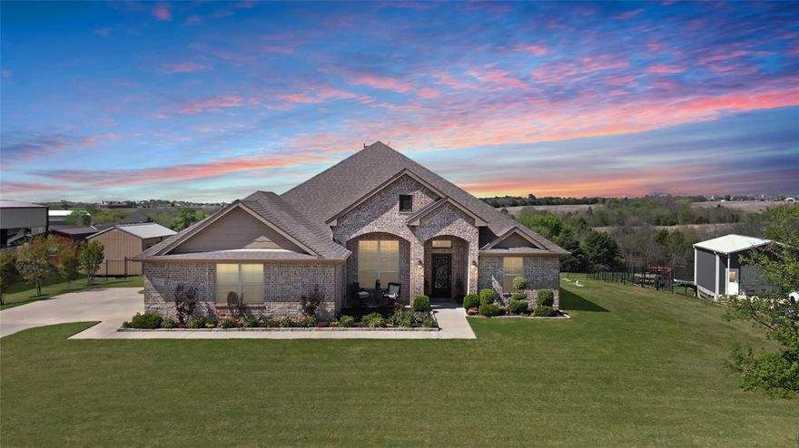 Leave the hustle and bustle of city life behind and retreat to this stunning one-story home with breathtaking sunsets situated on a sprawling 1.286-acre lot with no HOA! This light and bright floorplan offers 4 bedrooms, 3 full bathrooms, 3 car extended garage, formal dining, study, open-concept living and dining and a beautiful stone wood-burning fireplace. The oversized primary bedroom features picturesque windows overlooking the vast backyard, and includes a walk-in shower, garden tub, separate vanities and a large closet. The backyard is complete with a wrought iron fence, and a shed with electrical and air compressor lines that run from the shed to the garage for added storage or a workshop. Upgrades include: Home is spray foam insulated ensuring optimal energy efficiency; New paint and chair-rail added to formal dining and breakfast area; accent walls in all bedrooms and living room; Exterior invisible dog fence (includes two collars); Wired for outdoor speakers; Automatic front outdoor up lights; Upgraded laundry room; Hardwoods throughout; New disposal '25; New dishwasher '24; Septic serviced March '26.