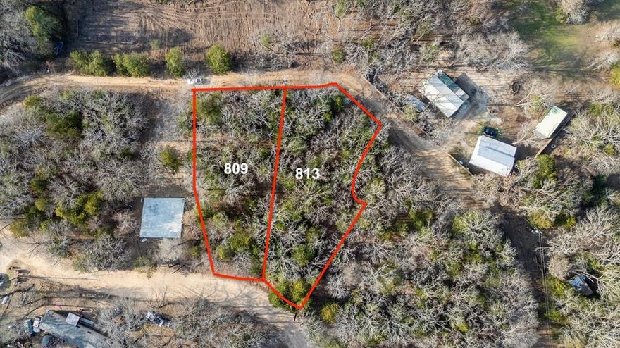 Great opportunity to own adjacent lots (809 Wood Duck Terrace AND 813 Wood Duck Terrace together OR separate)! Over three quarters of an acre in the beautiful Quinlan, just minutes from Tawakoni Lake and Walnut Cove Marina, perfect for hunting, fishing at the nearby lake, or building.  This lot features mature trees, offering a serene setting for your future plans. No survey available. Utilities are available at the street. Buyer or Buyers Agent to verify all info, zoning, and easements.