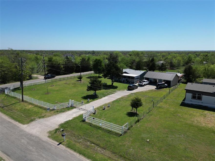 This house is ready to welcome new owners , beautiful property is on 1  acre lot,  3 bedroom 2 bathroom, living area has wood burning fireplace, dining and beautiful kitchen with huge granite island. An extra space can be use as an office. Separate Laundry room. Huge carport to park 3 cars, it has stairs to storage area.Electric gate, new fence. this house has front and back porch to enjoy mornings or evenings. Septic tank has  maintenance every 3 months. The house is in a corner lot with electric gate.

Buyer agent to verify all information