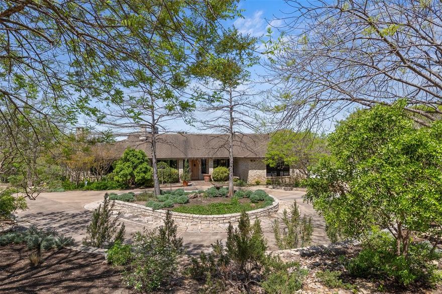 This single-level estate offers an exceptional blend of timeless design and modern luxury on one of Aledo’s most coveted and private streets. The home is filled with natural light, featuring three wood-burning fireplaces, a concrete tile roof, brand-new windows, and a primary suite with its own fireplace, private study, and spa-style bath. Flooring throughout combines wood and carpet for warmth and style. Outdoor living is unmatched with a resort-style pool and cabana, patios, multiple seating areas, and a pool house with a bathroom and storage. A separate 2,700 sq ft guest house includes a full kitchen, laundry, wine room, full bath, and 4-car carport, perfect for multi-generational living or hosting. The property also includes an upgraded water system with Trinity and Paluxy water wells, and abundant storage. Set on 8.77 acres with an optional adjacent 1.97 acres, this estate combines privacy, thoughtful architecture, and luxury living in the Aledo acclaimed school district.