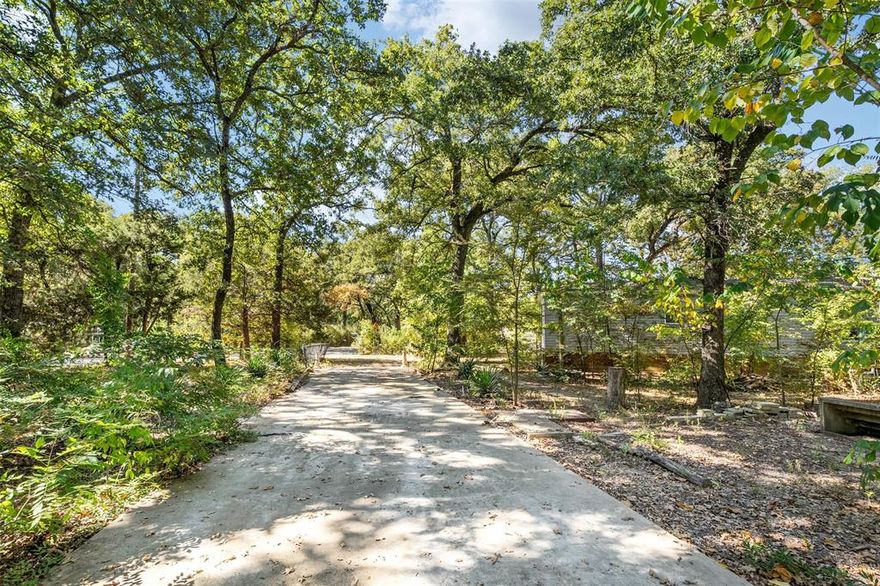 Welcome to your next chapter in this almost NEW, barely lived-in home, offering the perfect blend of modern comfort and versatile living space. Situated on two spacious lots with canopy trees—including a premium corner lot—this property is a rare gem in a desirable subdivision with exclusive access to a POA park and private boat ramp. Step inside to an open-concept floor plan that seamlessly connects the main living area to a modern kitchen featuring a large island, perfect for entertaining or everyday living. A second living room provides the ideal space for a home office, media room, or play area—tailor it to your needs. Outside, enjoy an extended paved driveway, offering ample parking for multiple vehicles, boats, or guests. You’ll also find a sturdy shed with a concrete floor—big enough to use as a workshop or storage space. Home also meets all requirements of the EPA's Energy Star program. Refrigerator and washing machine conveys at closing.