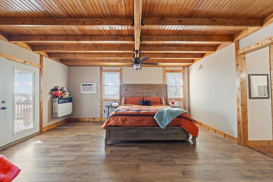 Major value-add opportunity on a full one-acre corner lot outside city limits. Priced to reflect needed cosmetic updates and ready for its next transformation. This is the kind of property investors wait for — strong footprint, desirable lot size, and clear upside potential.

The home offers multiple living areas, an oversized kitchen layout, and a large primary suite addition completed in 2021 featuring wood ceilings and French doors opening to an expansive shaded deck. The flexible floor plan allows for reconfiguration, modern updates, or strategic improvements to maximize value.

Outdoor features include a workshop space, and multiple outbuildings — ideal for storage, hobby use, or added functionality. Private road location and one-acre setting enhance long-term resale appeal.

Sold as-is. Seller will not make repairs. Bring your vision and your offers — all serious offers will be considered.