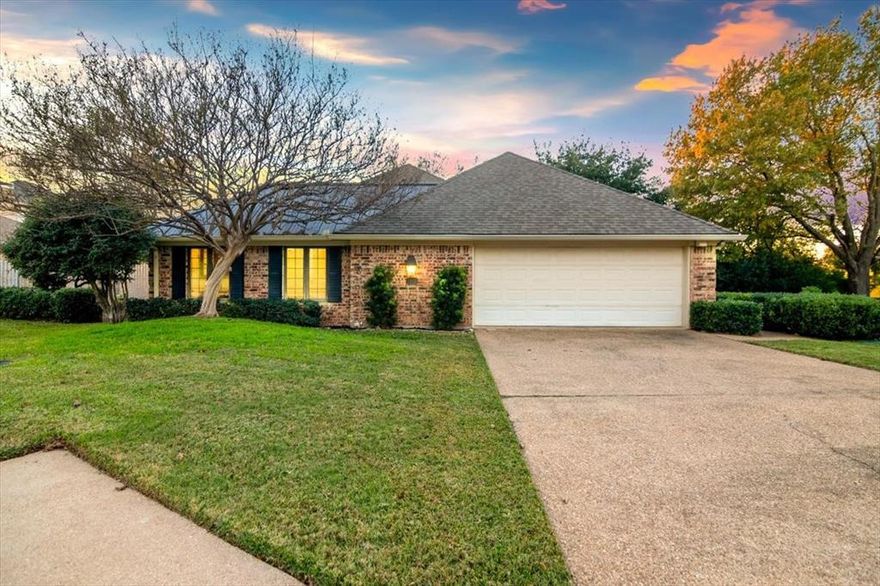 Welcome to this beautiful home located in Windmill Hill.  One of Waco's most desirable patio home neighborhoods,  tree lined streets and timeless, quality built homes abound. Situated on an interior street with little traffic, this patio home backs up to a beautiful wooded lot, providing so much privacy.  
As you enter the home through the gated patio, you will immediately feel the charm and quality throughout!  The spacious entryway opens to a large but warm formal dining room which is also open to the oversized living room.  Wood flooring and a wood burning fireplace plus newer picture windows along the front of the home provide so much natural light throughout.  
Any chef would adore the large kitchen with oh so much counter space and cabinets.  Enjoy your meals or just relax with a beverage while  overlooking the beautiful neighborhood from the large plate glass window in the breakfast area. 
This unique floor plan provides so many options for everyone's lifestyle.  The isolated primary suite has its own fireplace and built ins with sliding glass doors that exit to the private covered patio along the back of the house.  The isolated second bedroom also has it own in suite bath. The office with built ins could be a cozy suite for guests. A fantastic feature of this home is the large bonus room that could be a third bedroom, office, artist's studio, or kid's camp, along with  a BEAUTIFUL LAKE VIEW and its very own separate entrance.