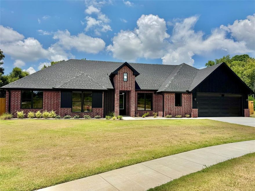 Welcome to this stunning new construction 4 bedroom, 2.5 bath home in highly sought after Lindale ISD. Featuring vinyl plank flooring throughout, this home offers durability and style in every room. The spacious kitchen is a chef’s dream with a gas stove, large island, ample cabinetry, and refrigerator included. Enjoy cozy evenings by the gas log fireplace in the open living area. The primary suite is a true retreat with a luxurious bathroom that includes a soaking tub, tiled shower, dual sinks, and a huge walk-in closet. A generously sized laundry room with a sink and built-in cabinets adds convenience. Step outside to a large covered patio perfect for relaxing or entertaining. This home blends comfort, functionality, and modern design in an ideal location.
