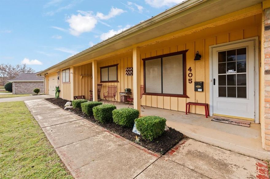 Priced to sell. Tucked away from the hustle and bustle, this home offers a calm retreat for you and your family. Located in Phase 1 of Mountain Valley you will be amazed at the wonderful neighborhood. From the back porch, your entire family can view a private lake and still have plenty of room for the kids to play! Perfect for first-time homebuyers. There is a delightful bonus room, make it your reading room, playroom for the kids or an office- it is out of sight from the rest of the family. The dining room has original hardwood floors, updated kitchen includes all appliances & washer and dryer. The home has a water filtration system. The living room has a cozy fireplace, wet bar-- yes, it's so retro 60's or make it your newly designed coffee bar! Also enjoy beautifully appointed built-in cabinets which personalize the room. Take pleasure in covered porches both front & backyards. Highly rated-Joshua ISD schools, medical facilities, shopping and entertainment are minutes away.