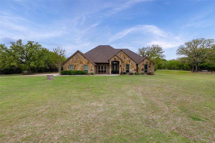 One story, one owner Custom home built by Platinum Builders, on 1.2 acres. Well and Aerobic. Sits very regal on a cul de sac and a NEW HVAC system. Four bedrooms or use the 4th for a private office, open floor plan, authentic handscrapped wood floors and ceramic tile in the wet areas. No carpet anywhere! Enter into the stately 8 foot iron door into a barrel entry ceiling which was custom painted for a leather look. To the left is the dining room or use it for your home office or build shelves for a wonderful library. The living room boasts a floor to ceiling stone fireplace with brick insert not the metal insert for a real wood burning fire if you wish. The builder added custom triple crown molding and 5 inch floor molding. The kitchen has granite, stainless appliances and tons of custom cabinets that have recently been refurbished. It looks amazing. Walk in pantry to fill up at the Costco or HEB which is 10 minutes away. The master is quite spacious 16 x 15 and has a 92 square foot closet. It even opens up to a door into the utility room for extra convenience. The backyard looks to the West with a large patio 15 x 30 and has several seating areas.  The seller purchased a small .23 of an acre in addition to the acre they have for extra interest. The split bedrooms give a lot of privacy and they are in the North wing of the home. If you are up for fishing, go across the street to a charming pond which is maintained by the HOA. There are two, one in phase 1 and this one in phase 2 which gives an elegant touch. Trees are bountiful in the neighborhood, unlike many of the new developments without trees. Only 60 miles from Dallas International Airport, 45 miles West to the new Palo Pinto Mountains State Park on Highway 4. Parker County has 180,000 residents, lots of great amenities, quality of life is great. Historical homes, great restaurants, Weatherford Lake, Medical City, Cooks Children's Hospital and Texas Health are here. Come live the Good Life.