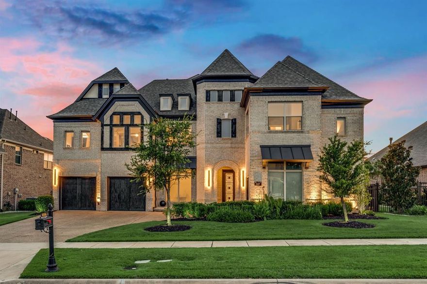 Sophistication meets seclusion at this exquisite estate in the prestigious, gated Hills of Kingswood. Crafted for a refined lifestyle, every detail reflects luxury living in one of Frisco’s most exclusive neighborhoods. The light brick exterior, pristine landscaping, and stately wood garage doors set a sophisticated tone, while soaring ceilings, expansive windows, and rich hardwood floors create an airy, light-filled interior. A grand foyer with sweeping staircase leads into spaces designed for both entertaining and quiet retreat, including a private study and elegant dining room with built-in wine storage. The chef’s kitchen is a masterpiece with quartz countertops, oversized island, commercial-grade refrigerator, KitchenAid gas range, double ovens, & a spacious walk-in pantry. The kitchen flows seamlessly into the breakfast nook with coffee bar & abundant natural light. The living room impresses with floor-to-ceiling windows and fireplace. The primary suite offers vaulted ceilings, patio access, and a spa-like bath with stand-alone tub, dual vanities, and custom walk-in closet. A versatile flex room and guest suite, each generously sized with custom finishes, complete the first floor. Upstairs, an expansive game room features a well-equipped wet bar, while the media room offers a sunken layout with an accent wall & surround sound for a true theater experience. Two additional bedroom suites, including one that rivals a second master with luxurious en-suite bath, provide comfort and privacy. Outside, enjoy a covered patio with speakers, outdoor kitchen, gas firepit, and sparkling pool & spa framed by manicured trees and greenery. Upgrades include custom closets throughout, whole-home water filtration, new designer lighting, and recent bathroom renovations. Tucked behind guarded gates, The Hills of Kingswood offers unparalleled privacy and architectural distinction, with scenic greenbelts, oversized lots, & close proximity to Legacy West, The Star, &PGA Frisco.