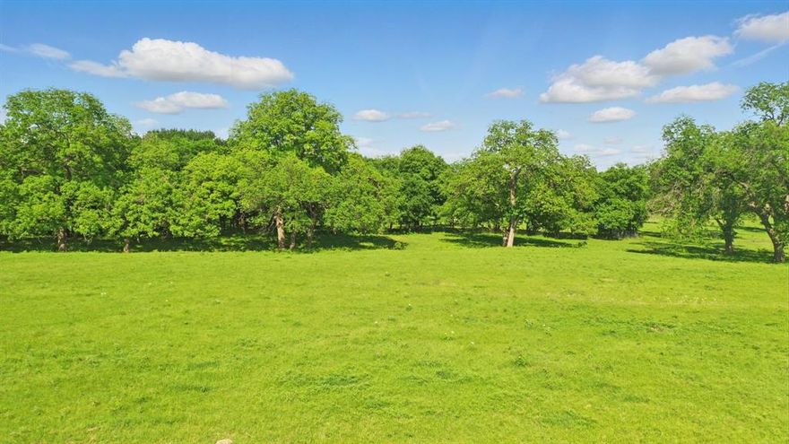 One of Three 2+ Acre Lots Overlooking the Brazos River that feeds into Lake Granbury located less than 5 minutes from Downtown Granbury and all it's Amenities!!!  Also located only 50 minutes from Ft Worth this property has very few restrictions but just enough to keep the neighborhood Neat, Clean and Inviting.