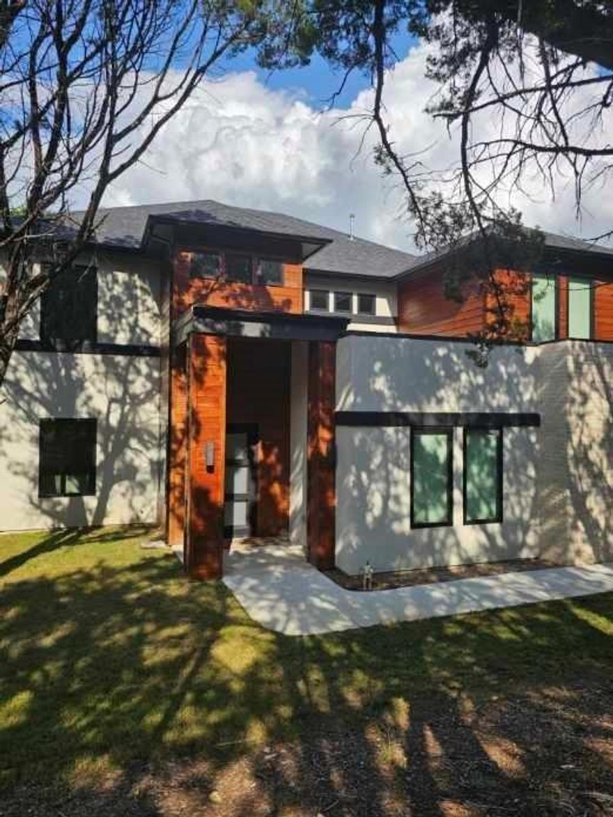 If you are seeking a home that doesn't compromise on seclusion, location and incredible views, then look now further! Come see this one of a kind modern designed build home, nestled back next to the Cedar Hill State Park. This home was intentionally designed in mind for the landscape around it and every level has a story. The first level offers a feeling of a house in the woods, as large windows let in lighting combined with earthy tones from the forest that surrounds it. As you make your way up to the second story, you are immediately greeted by the rolling hills that eventually give way to the state park, as this view continues throughout your home study, and primary bedroom, with a secluded master balcony off of the primary bathroom. Additional views can be seen off of the 3rd story crows nest, with even better views of the hills, Joe Pool Lake and downtown Arlington. And all of this while being 25 minutes from downtown Dallas. This home truly does an exemplary job of bringing the outside in! Come see today!