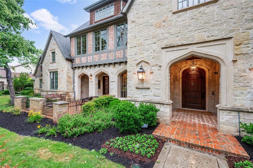 This thoughtfully designed custom home on a sprawling acre lot, offers luxurious finishes and meticulous attention to detail. Intimate gathering spaces seamlessly flow from the formal areas to a cozy brick-arched sitting room with built-in wine fridge and refrigerator drawers. The French doors lead to front patio with a fire pit. Main floor features a grand primary bedroom with a dream bathroom, office space with a library loft, an entertainer's kitchen with two islands, superior appliances, back pantry with warming drawers, spacious family room, a large utility room, and media room. Upstairs, discover three spacious ensuite bedrooms and a game room. Outside is an expansive covered outdoor living area featuring a Wolf BBQ and stone fireplace. Lush landscape with ample grass and space for a future sports court surround the pool and spa, plus an outside pool bath. This home has Lutron and Home Automation Systems. A gated oversized four-car garage provides ample storage and parking space.