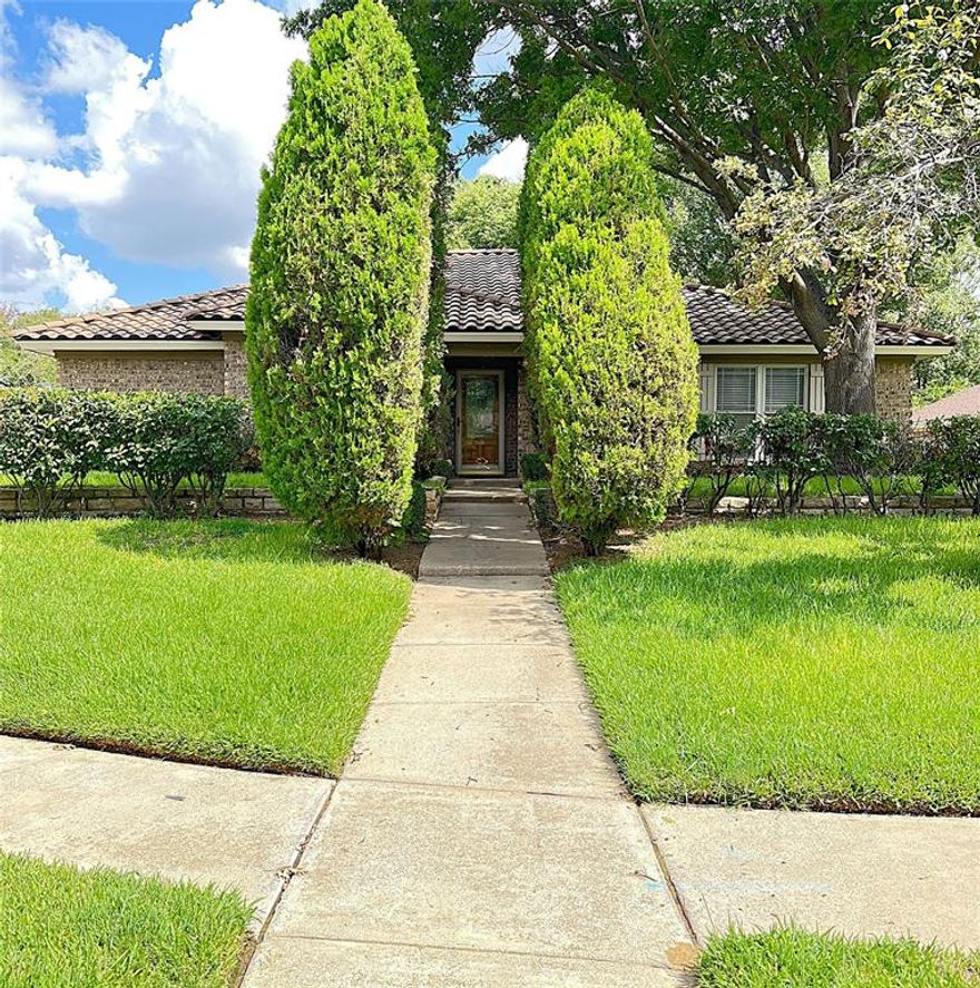 Spacious and inviting, this single-story 3-bedroom, 2-bathroom home with a 2-car garage is ideally located in the heart of Bedford. Thoughtfully updated throughout, it features a beautifully renovated kitchen and bathrooms that blend style and function. At the center of the home, you'll find an enclosed, air-conditioned atrium with skylights—a bright and tranquil space ideal for an indoor garden or reading nook. The generous living area showcases warm wood paneling and a charming wood-burning brick fireplace, creating a cozy and welcoming atmosphere. The galley-style kitchen is equipped with sleek granite countertops, stainless steel appliances, and ample cabinetry. The spacious primary suite includes dual vanity areas, a garden tub, separate shower, and dual walk-in closets. Additional highlights include a hall bath with dual sinks, ceiling fans throughout, a fenced backyard with an open patio, a sprinkler system, and a covered 2-car garage. Owner must approve all pets. Owner maintains lawn.