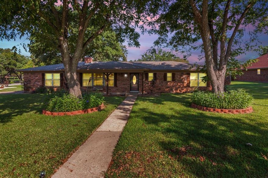 **Seller is offering a $5,000 buyer incentive towards HOA fees or closing costs.  Bring all offers**.  Want to live in a well-established gated community with private golf course? Here is your chance. This well-maintained home does not come available in the De Cardova subdivision often. The drive through the guarded gate gives you the feeling of security for the family. This home is located well into the community & is located on the corner of Cortez Dr & Choctaw Dr. The lush established trees on the property give lots of shade to help keep the home cool in the hot days of summer. The front porch is inviting & leads you into this home. As you walk into the front entry you will notice tile flooring flows throughout the home making it easy to care for with kids & pets. Living area, one is as you enter the home with a fireplace & natural light flowing in from the windows. The kitchen & dining area are combined making it easy to serve family & friends. The kitchen has granite counter tops, electric cooktop, electric oven, pantry & stainless sink. The laundry room has cabinets for storage, room for full size washer & dryer. The extra room off the kitchen can be used in so many ways, i.e., office, animal area, play area for kids. The primary bedroom & bath, secondary bedrooms & bath will delight family & friends. The second living area is off the kitchen that could be used in many ways, i.e., play area for kids or tv area. Walking outside to the backyard you will notice the well-built fence around the perimeter of the backyard, a pergola, dining area, large storage workshop with electricity, fenced dog-run, blank slab area that is wired for a hot tub or for anything you want. The location of this home puts it in demand due to easy access of major highways, Granbury Lake, schools, restaurant’s, entertaining & shopping. Come see for yourself!