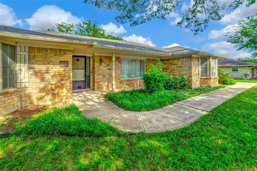 New improved price! Nestled in the heart of Edgecliff Village, the charming residence at 6021 Sycamore Creek Road offers a perfect blend of comfort and taste. This well-built 3-bedroom, 2-bathroom home has a spacious and inviting layout, ideal for modern family living. The expansive living room serves as the heart of the home, featuring a cozy fireplace and elegant French doors that open to a generous backyard adorned with mature trees, creating a serene outdoor retreat. A bay window admits sunlight into a generously sized master bedroom with an ensuite bathroom and a deep walk-in closet for ample storage. The two identical secondary bedrooms, each with its own bay window—one featuring a cozy window seat—offer versatility and charm, perfect for family, guests, or a home office. A pocket door separates the living room from the two bedroom suite served by a common bathroom. The thoughtfully designed laundry room includes built-in storage and leads to a large functional pantry. With its meticulous craftsmanship and inviting spaces, this home is a true gem in Edgecliff Village. The house also has a new roof installed in 2024 and completely new AC system installed by a very reputable AC contractor.  The bonus feature is a 3 car garage with a back yard access.