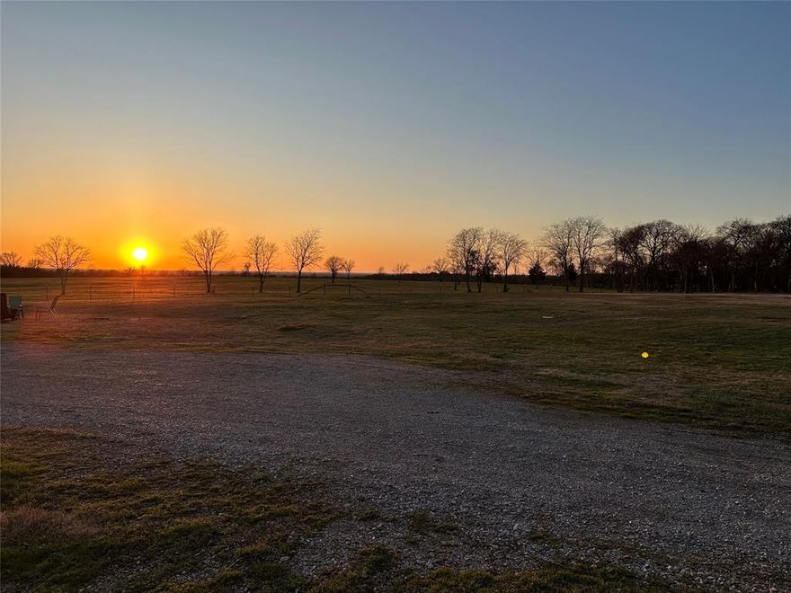 A rare find of 17.6 acres located outside city limits with current Ag exemption. This is the perfect spot to build your dream home in the highly sought after Gunter ISD with current Ag exemption with crops and bees. Property has 2 gravel roads....one that leads to the already existing building pad that boasts an unbelievable view and one that leads to the existing shop located at the back of the property. There is a 60x50 metal shop that has electricity and water. The shop also has a second story storage loft, one side that is climate controlled, spray foamed, extra tall ceilings and 3 garage style doors. Located outside city limits with utilities installed. Come take a look and make these beautiful sunsets your daily view!