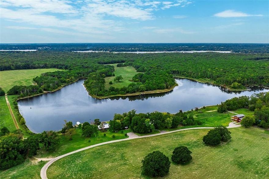 PRIVATE 34 ACRE LAKE & PRISTINE RECREATIONAL RANCH 
LOCATED 1 HOUR FROM DALLAS

Private and pristine recreational ranch estate nestled on 312 acres. The serene setting provides rejuvenation from city noise located 1 hour outside Dallas. Mature burr oaks and magnificent old-growth pines are abundant throughout the ranch. Several trails traverse the property including a well-stocked 34-acre lake and boat dock.  A huge, unencumbered sky view offer a haven for stargazers. A rare and very special place for your secondary home or family compound. 

Luxury Amenities
• Main house, Clubhouse, Guest Cabin
• Barn with full kitchen and living quarters.
• Infinity pool and spa
• 34 AC Private Lake
• ATV, Tractor
• Outdoor living 

Additional Property Features:
• Fishing: bass, crappie, catfish 
• Boat dock
• Pickle Ball space (not installed yet)
• Outdoor fireplace and grill