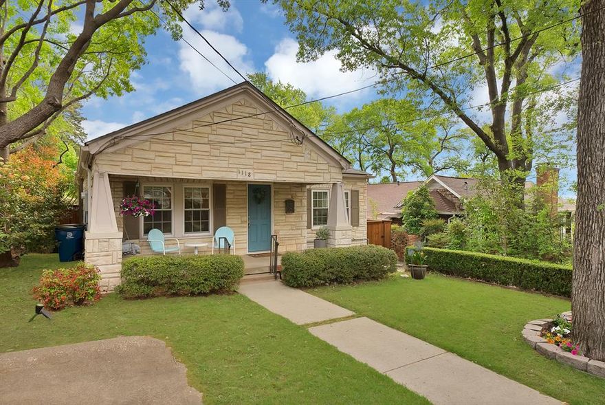 Looking for a Craftsman bungalow near White Rock Lake?  This 3-bedroom, 2-bath home in Hollywood Heights is within the highly desired attendance zone for award-winning Lakewood Elementary. Situated in a historic neighborhood and within eyeshot of Hole No. 3 at the D.A. Weibring-designed golf course at Tenison Park, this home offers classic character, modern updates, a large backyard, and a location that puts East Dallas living front and center. It's ideal for buyers searching for walkable neighborhoods, nearby trails, and top-rated schools. Inside, you’ll find hardwood floors, defined living and dining spaces, and an updated kitchen with granite countertops, built-in cabinetry, breakfast bar seating, and modern appliances. The single-story layout creates a natural separation between living areas and bedrooms, while features like vaulted ceilings, decorative lighting, and a built-in wine cooler add both style and function. If you’re searching for a move-in ready home with character and updated finishes, this one checks the boxes. The primary suite includes an ensuite bath with dual sinks, separate shower, and walk-in closet, while secondary bedrooms offer built-in storage and flexible use for guests, office, or hobbies. The spacious living room flows into a dedicated dining area, creating comfortable, defined spaces for everyday living and entertaining. Enjoy a covered front porch for morning coffee, plus a backyard deck and fully turfed yard with privacy fencing—ideal for entertaining, pets, or low-maintenance outdoor living. The converted garage provides flexible space for a home office, gym, creative studio, or bonus room -- and contains a lockable shed in back accessable from outdoors. Located just steps from the Santa Fe Trail, down the street from neighborhood gathering spot Lindsley Park, and minutes to White Rock Lake, Lakewood Village shopping, dining, and coffee spots, this East Dallas home offers easy access to walking, biking, and everyday conveniences.