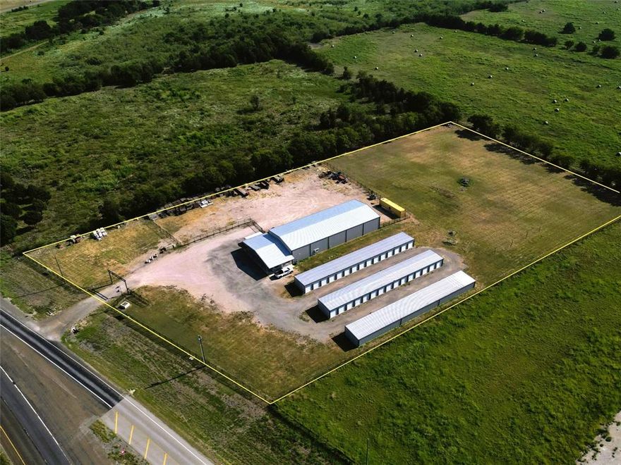 Located on SH 175, with easy on, easy off access, this 5 acre – Income Producing - commercial property features an exceptional 7,500 SF office warehouse with a large gravel yard that is completely enclosed with a durable 6’ wrought iron fence.  In addition, there are 60 - fully leased – self storage units generating $54,000 annually (30 – 10x10’s and 30-10x20’s = 9,000 SF).  There's 1,700 SF of tasteful office that includes stone and granite entry with wood-like flooring thru-out, reception, conference area, three executive offices, a break room and LED lights thru-out.   The 5,800 SF insulated warehouse  has approx. 20’ clear height, four oversized 14’x16’ rollup doors, five entry doors, LED lights and a nice shop restroom with a shower.  Very nice property with immediate revenue plus plenty of room to build additional buildings to meet growing needs.  The front electronic gate (with 100 different entry codes) adds security and ease of access for the owner and the storage tenants.