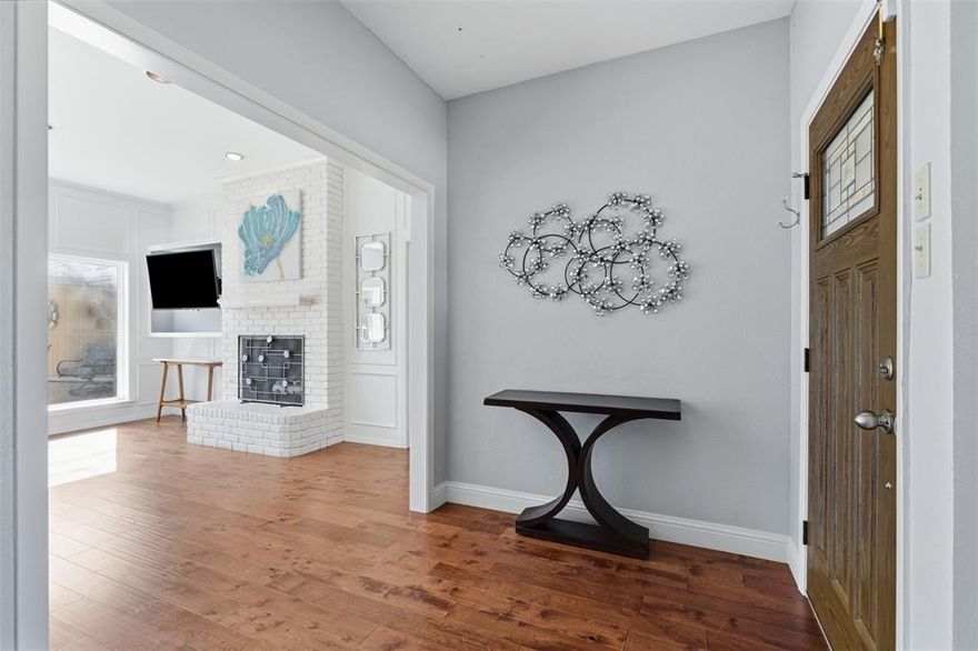 Stunning Lake Highlands gem in prestigious RISD! This exceptional home delivers everything on your wishlist! Recent updates include, new HVAC installed 2024, irrigation upgrade 2024, privacy fence installed 2020, Pella windows, french drain & gutter installation, EV car charger, pool pump 2023, pool heater upgrade 2021, updated electrical panel and more! Step through the welcoming foyer and discover a thoughtfully designed layout that separates public and private areas. The bright, versatile front office—complete with large bay windows—could easily serve as a formal dining room. Flow seamlessly into the heart of the home: a grand living area featuring soaring vaulted ceilings, elegant wainscoting, and floor-to-ceiling windows showcasing views of the serene courtyard and sparkling pool. The gourmet kitchen delights with granite countertops, ample cabinet storage with under-mount lighting, and generous counter space. The adjacent eat-in area creates the perfect spot for casual dining and morning coffee. Unwind in the secondary family room, conveniently located near a powder bath and thoughtfully designed built-in storage—ideal for pool essentials. Meander outside to enjoy the private oasis featuring a sparking pool with heater, charming courtyard, and cozy firepit area. The sleeping quarters offer true privacy with three spacious bedrooms, including one with a walk-in closet, plus a full bath. Bedroom four - the luxurious primary suite serves as your personal retreat, boasting a generous walk-in closet and spa-like ensuite bath designed for ultimate relaxation. A full-size laundry room with folding station adds convenience to daily life. This meticulously maintained, fully updated home offers the perfect blend of elegant entertaining spaces and private family living.