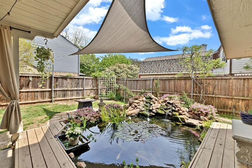 If you've been looking for the ultimate entertaining house in the Porter Elementary zone, look no further! This corner-lot beauty was designed for gatherings combining exceptional curb appeal with the financial advantage of Hurst city taxes and the prestige of highly sought-after Birdville ISD schools—including Porter Elementary, Smithfield Middle, and Birdville High—further enhanced by extra parking specifically designed for a boat or RV. The spacious downstairs layout is tailored for effortless living, featuring two dining areas and two living spaces that flow seamlessly into a bright kitchen with an abundance of integrated storage. The main living room offers a sophisticated touch with remote-controlled shades and a classic marble fireplace with a wet bar, while the entertaining space extends outdoors to a large covered patio overlooking a tranquil koi pond. Upstairs, modern updates elevate the interior, including brand new LVP flooring in the primary ensuite bath, new fixtures and a beautifully redone secondary bathroom. Adding to the home's long-term value, the HVAC system has been upgraded for 410A refrigerant. While the home is ready for its next chapter and the living room television is negotiable, please note that the koi fish and the spa-hot tub do not convey.