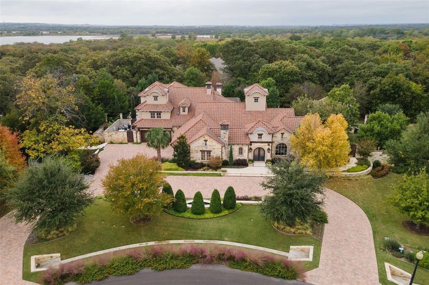 Exquisite Estate, nestled among mature trees is situated in the sought-after Chimney Rock subdivision, a premier Flower Mound Conservation Neighborhood with horse trail access, stunning greenbelts and walking trails! 1 ACRE LOT! Flower Mound schools & just minutes to Liberty Christian School! Elegant home features breathtaking views, grand scaled reception rooms, intimate family spaces, lavishly painted ceilings, venetian plastered walls, 7 Fireplaces, 68 KW Generator, Aqua link controls, sound & lighting systems! Palatial Living spaces w-exquisite finishes & details, oversized windows bring in natural light! Gourmet Chef's Kitchen, Private Master Retreat w-spa bath! Great sized guest bedrooms, Media & Game Rooms + Formals! Remarkable Backyard Retreat w-approx 3,926 SF of outdoor living space, verdant landscaped grounds, multiple patio areas, resort style pool, grand firepit, outdoor kitchen + KOI pond! 4 car garage! Great Location, quick access to DFW Airport, Southlake & Westlake!