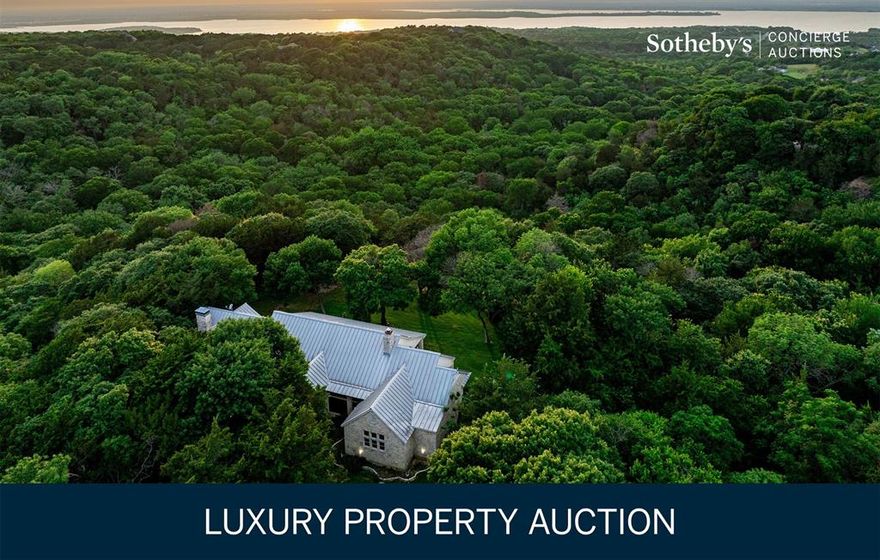 Located minutes SW of downtown Dallas with magnificent 20-mile views from atop the county’s highest point. Unique residence and farm, with views of Joe Pool Lake from the back porch of the house. The farm’s 124+- acres offer pastureland, native grasses, deep ravines, thick woods teeming with wildlife, a sparkling pond, and spring-fed creeks, while civility comes in the form of the custom home, a handsome garage-apartment building and a classic barn. The stone home features many amenities, a great vaulted-ceiling room with wood trusses and a stone fireplace; a gourmet kitchen with a center island; a study with a fireplace; and three spacious bedrooms, including the sequestered primary suite with its spa-like bath. Two-story garage with climate-controlled workshop. Equipment barn located near one of the pastures and working pens, Endless recreational opportunities. Seller requires buyer to provide proof of funds prior to scheduling a showing.