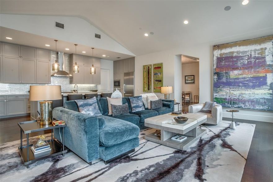 The Mondara offers a luxurious and sophisticated living environment, embodying a hassle-free, lock-and-leave lifestyle. This exquisite top-floor unit features soaring vaulted ceilings, beautiful hardwood floors, an abundance of natural light, and updated designer details that enhance its overall charm. Nestled in the heart of Highland Park, with the Katy Trail and Knox Street just steps away, this property seamlessly combines elegance and convenience. The Chef's Kitchen is a masterpiece, showcasing quartz countertops and an oversized island perfect for entertaining. An office space and a private terrace overlooking the serene courtyard. The Master Suite is a sanctuary, boasting a spacious walk-in closet, and a spa-like bathroom, ensuring your utmost comfort. Distinguished by its tasteful designer touches and treatments, this sleek condo offers an all-encompassing living experience.