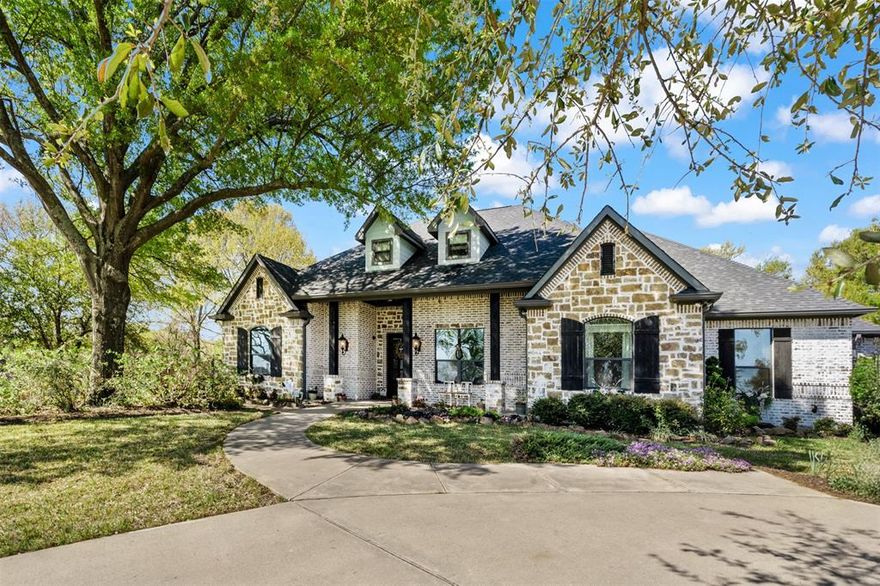 Discover the perfect blend of luxury and comfort in this stunning 3,238 sqft house nestled on a sprawling 1.508 acres in an exclusive gated community. Overlooking picturesque Cedar Creek Lake, this property features exceptional amenities that cater to both leisure and lifestyle. Step inside to a bright and airy open floor plan, where the spacious living room invites you to unwind. The striking wooden staircase serves as a stunning centerpiece, leading to an additional living area. The chef's dream kitchen boasts built-in cabinets, a granite island bar and premium appliances, making it perfect for entertaining friends and family. Enjoy serenity in the well-appointed bedrooms with walk-in closets for all your storage needs.  Experience movie nights like never before in your dedicated media room, designed for the ultimate cinematic experiance. Step outside to your private haven featuring an inground pool, perfect for hot summer days and a beautifully landscaped yard with wrought iron fencing. Enjoy evenings under the stars, hosting barbecues or simply relaxing by the pool. This property offers a lifestyle of peace, security and camaraderie.This exquisite house is a rare find and an invitation to live your dream. Whether you're looking for a forever home or a serene getaway, it perfectly merges luxury with functionality. Also included in this home is a cooled and heated dog room for fur family lovers.  Schedule your private showing today and take the first step towards making this dream home yours.