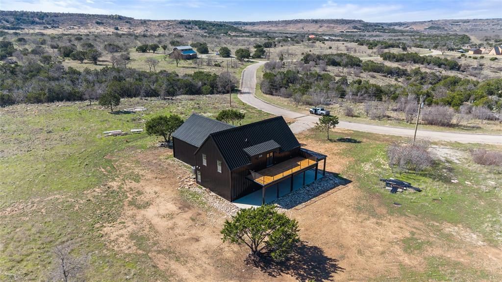 Photo of 1053 Bluff Creek Drive, Strawn, TX 76475 (MLS # 21208325)