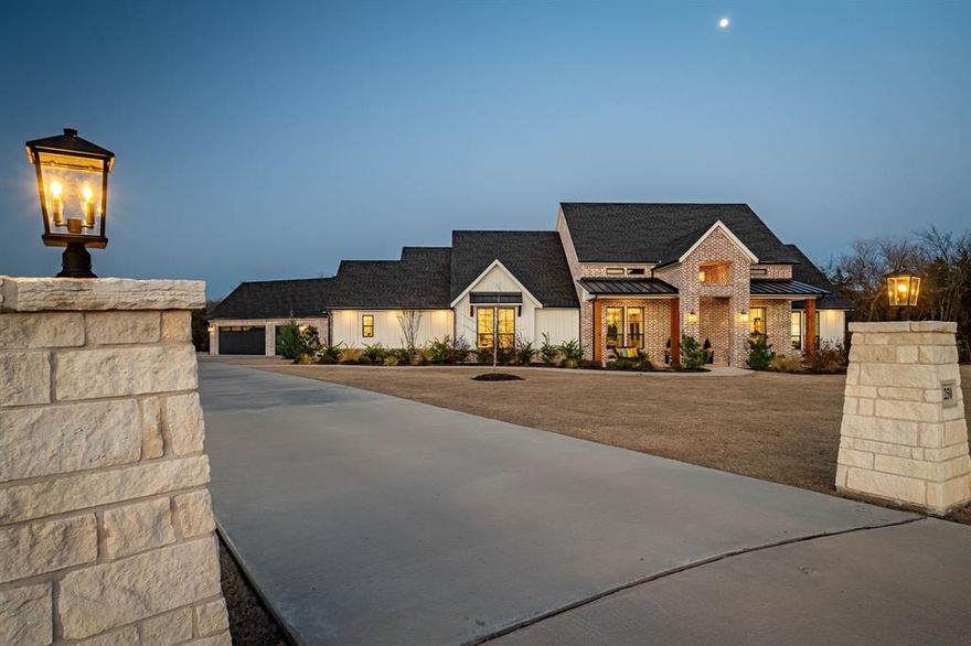 Discover the perfect blend of elegance and modern convenience in this 4 bedroom, 5.5 bathroom estate, where each bedroom boasts its own ensuite for ultimate privacy and comfort.  Designed for both relaxation and entertainment, this home features a spacious gym with a full bathroom, a media room, a private study and a formal dining room - perfect for hosting festive dinners or intimate gatherings.  The heart of the home is the chef's kitchen, outfitted with a high-end Whirlpool sub-zero refrigerator~freezer, ensuring top-tier food preservation, a Forno gas stove, Hoshizaki ice machine and KitchenAide dishwasher.  A well-appointed butler's pantry adds even more functionality, offering abundant storage, shelving, and additional appliances --perfect for effortless meal prep and entertaining.  A large laundry room with two washers and dryers ensures efficiency for busy households.  Step outside to a beautifully designed outdoor living space, complete with a fireplace and built-in outdoor grill, ideal for year-round entertaining.  The property also boasts a stocked pond filled with a variety of fish, accompanied by a cozy fire pit--perfect for unwinding by the water.  The oversized 3+ car garage provides ample parking and storage, with the added bonus of a walk-up attic storage space for even more convenience.  Modern conveniences elevate this home, including two tankless water heaters, a 24kW Generac generator, a wired security system with cameras, and Wi-Fi extenders for enhanced connectivity.  Plus, Sonos porch speakers create the perfect ambiance for outdoor gatherings.  This exceptional home is a rare find, combining luxury, functionality, and the security of a gated neighborhood.