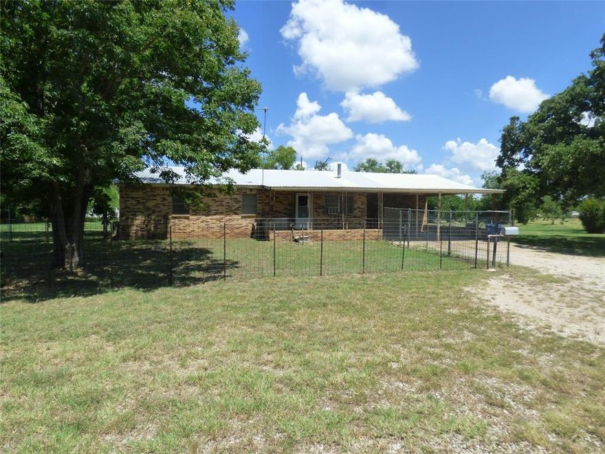 Built in 1965, this 3 bedrooms, 2 full bath home on a huge, secluded .66 ac lot in Cisco has loads of potential! With 5 city lots, there's plenty of room for a shop, pool, guest house, or whatever you want!  The yard is covered with huge shade trees all around. There's a 2 car carport attached that leads to an enormous utility room that has plenty of space to be a craft room, office, playroom, or even a 4th bedroom!!! Come see it for yourself!