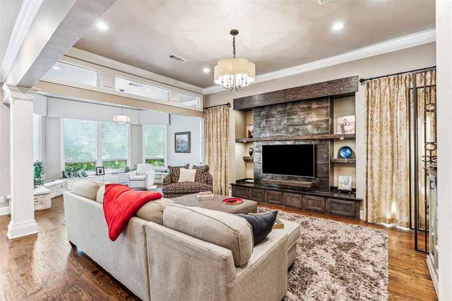 Extraordinary estate on 3.9 acres of peaceful land within the sought-after Lovejoy ISD. This property is a true rarity. Native trees, a field of bluebonnets, and unrivaled views of White Rock Creek that set it apart from any other. Inside, the home is a masterpiece of design, featuring soaring ceilings, intricate millwork, and floor-to-ceiling windows that frame stunning views in every room. LR overlooks a dramatic stone fireplace and expansive windows that flood the space with natural light. Master sanctuary, complete with access to a screened porch, a spa-inspired bath, and a double-sided fireplace that also warms the adjoining executive office. The chef’s kitchen and butler’s pantry flow seamlessly into the formal dining and family rooms, which includes a wine cellar, making this estate ideal for grand-scale entertaining. Outside, find a lagoon-style pool, spa, firepit, putting green, and an outdoor dining area perfect for gathering.