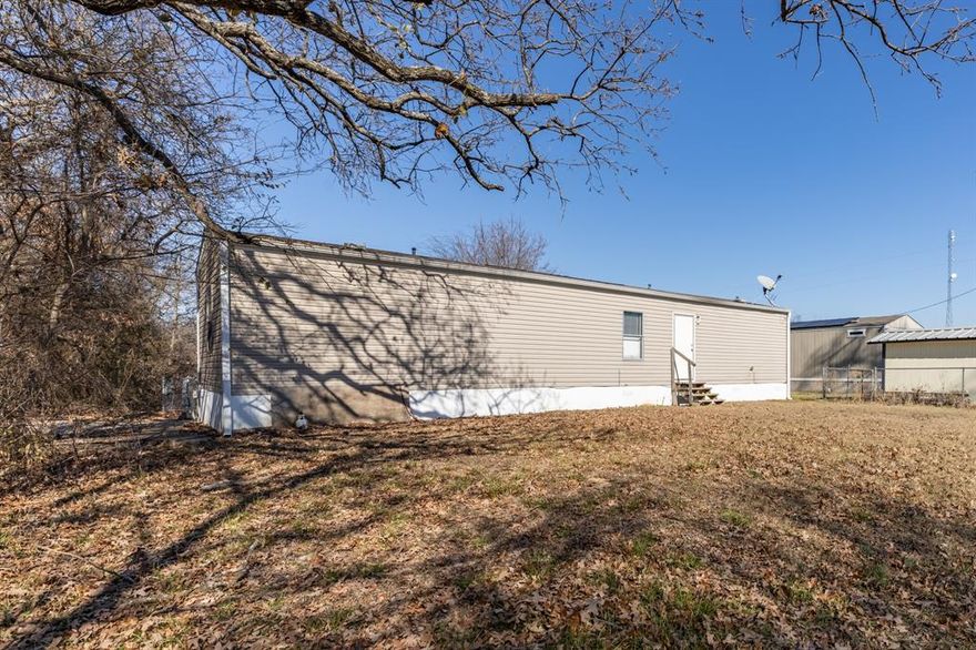 Well maintained 2 bedroom, 2 bathroom home located in the Holiday Village subdivision in Quitman, TX. This property offers access to all Holiday Village amenities, including a private boat ramp, clubhouse, community pool, and additional neighborhood features. Convenient floor plan with comfortable living spaces, ideal for full-time residence, weekend getaway, or investment opportunity. Enjoy the benefits of lake community living while remaining close to downtown Quitman and local conveniences.