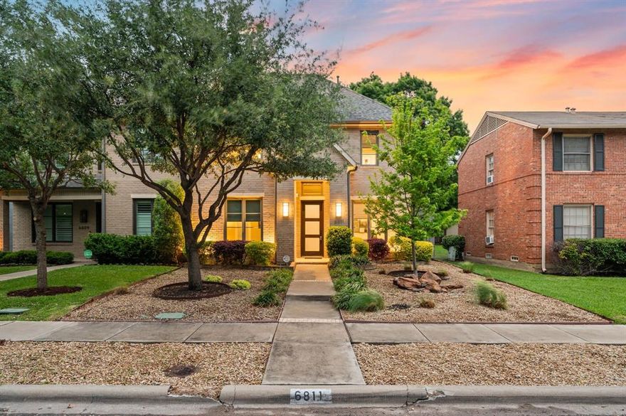 Welcome to this stunning, design-forward duplex offering the perfect blend of modern elegance and everyday functionality, all in an unbeatable location within walking distance to NorthPark Mall, dining, and entertainment. From the moment you enter, you’re greeted by a private office and a guest suite with its own ensuite bath, while luxury vinyl plank flooring leads you into an expansive open-concept living space made for both relaxing and entertaining. The chef’s kitchen is a true centerpiece, featuring stainless steel Thermador appliances, a full-size wine fridge, abundant cabinetry, and an oversized island with generous counter space ideal for gathering. The kitchen flows seamlessly into the dining area and spacious living room, where large windows fill the space with natural light and overlook the covered patio and outdoor grilling area. This thoughtfully designed home offers 4 spacious bedrooms, each with its own ensuite bath, providing ultimate comfort and privacy. Upstairs, a split floorplan includes two additional bedrooms, along with a versatile flex space perfect for a game room, fitness area, or second living space. A convenient wet bar connects to the media room, creating an ideal setup for entertaining. The primary suite is a luxurious retreat, featuring a spa-inspired bathroom with marble countertops, dual sinks with backlit mirrors, and an oversized walk-in closet with custom built-ins. Step outside to enjoy a covered patio with seating and a built-in grill, while the hardscaped front and backyard offer low-maintenance living. This exceptional home combines high-end finishes, smart design, and a prime location, truly a must-see!