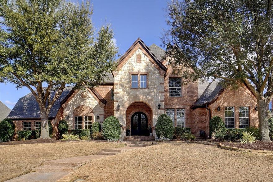 Welcome to your dream home, a stunning  luxury retreat nestled in a prestigious gated neighborhood on nearly half an acre. This exquisite property offers a perfect blend of elegance, comfort, and modern convenience, ideal for both entertaining and everyday living.

Upon entering, you’ll be greeted by soaring ceilings, rich wide plank oak floors, and designer finishes throughout. The expansive floor plan includes 4 beds and 4 full bath and one half bath thoughtfully designed for privacy and functionality. The downstairs master suite is a true sanctuary, featuring a spa-like bath with a soaking tub, an oversized walk-in shower, dual vanities and his and her closets. An additional guest suite is also located on the main level, providing comfort and convenience for visitors. Office with beautiful cabinetry is also downstairs.

The heart of the home is the gourmet chef’s kitchen, equipped with top-of-the-line Thermador appliances,  quartz countertops, a pot filler, and two walk-in pantries. The open-concept design flows seamlessly into the inviting family room, complete with a cozy fireplace and large windows that overlook the backyard retreat. Formal and casual dining spaces provide options for both intimate dinners and larger gatherings.

Upstairs, you’ll find two additional bedrooms, 2 full baths, a spacious game room, and a media room. There is also a flex room for additional office, exercise or music room.

Step outside to your personal backyard paradise. The covered patio features a built-in grill and outdoor living area, ideal for year-round entertaining. Take a dip in the in-ground heated pool or unwind in the separate spa, surrounded by beautifully landscaped grounds that offer privacy and serenity.

Located in the heart of DFW , this home offers an unbeatable combination of luxury and convenience. With easy access to shopping, dining, and top-rated schools, and DFW airport. This is more than a house—it’s the lifestyle you’ve been dreaming of.