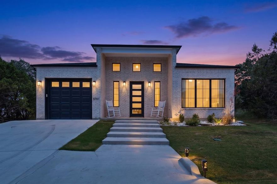 Modern sophistication meets timeless craftsmanship in this beautifully designed home located in a desirable lake community moments from the water in Granbury. The open-concept floorplan features soaring 14-foot ceilings in the living, dining, and kitchen areas, creating an airy space filled with natural light and designed for entertaining. This move-in ready home offers 3 bedrooms, 2 bathrooms, and a 1-car garage. Features include real wood cabinetry, quartz countertops, decorative lighting, LVP flooring throughout, tile in bathrooms, energy-efficient foam insulation, walk-in closets, and a fenced backyard with a pergola. Community amenities include 2 pools, tennis courts, basketball courts, parks, clubhouse, and nearby lake access.
