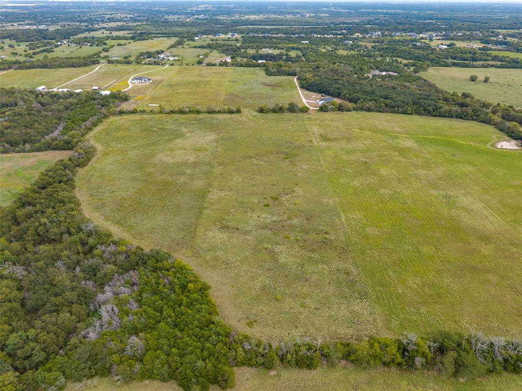 23.720 ACRES County Road 2216