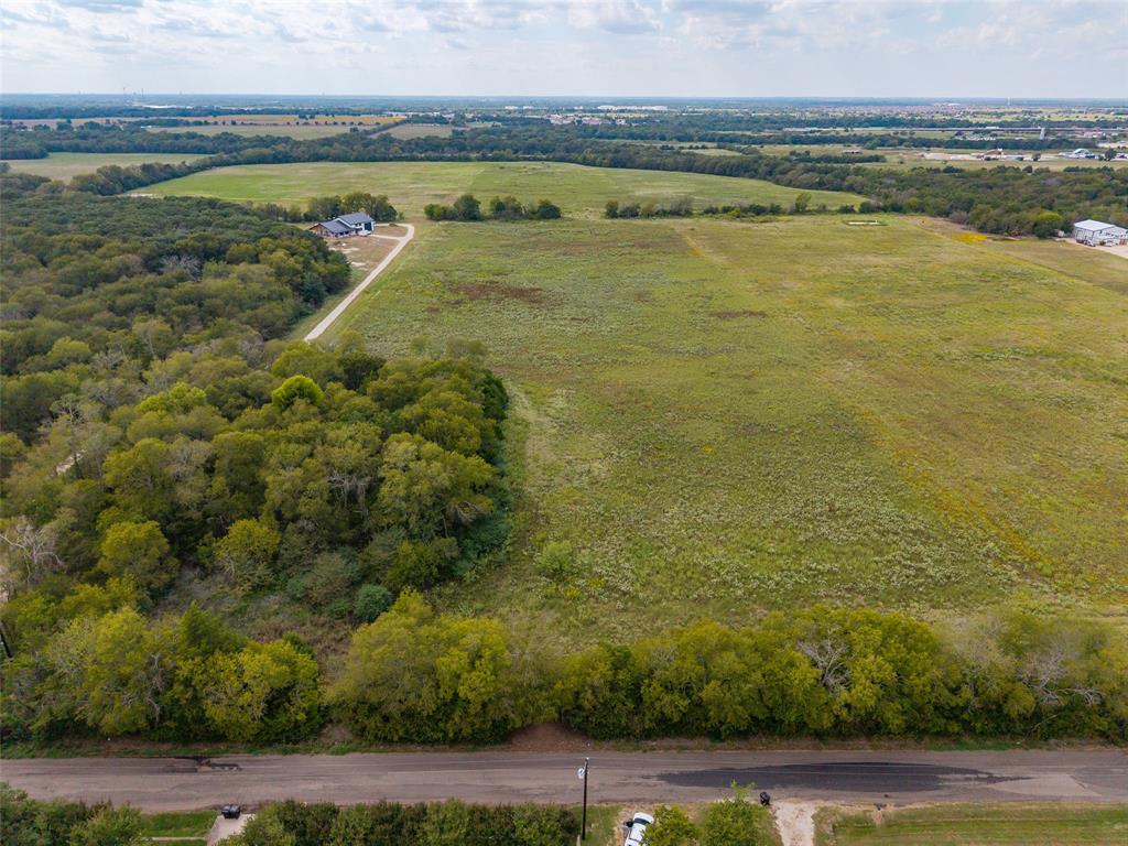 23.720 ACRES County Road 2216
