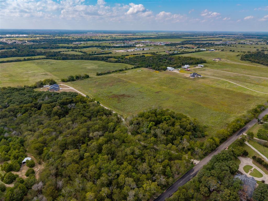 23.720 ACRES County Road 2216
