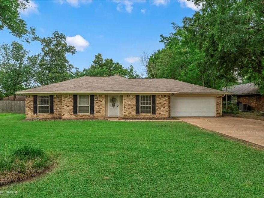 Welcome to this charming 3-bedroom, 2-bathroom home offering 1,890 square feet of comfortable living space in the heart of Benton. Inside, you’ll find two spacious living areas, including one with a cozy brick fireplace. The flexible floor plan allows one of the living areas to easily be converted into a fourth bedroom, game room, office, or hobby space. Out back, enjoy a large fenced in yard and a covered patio—perfect for outdoor entertaining, play, or relaxation. This home combines functionality with affordability, making it a great option for buyers looking for space and versatility. Conveniently located near schools, shopping, and dining, it offers both comfort and convenience. Don't miss out on your chance to own this home!