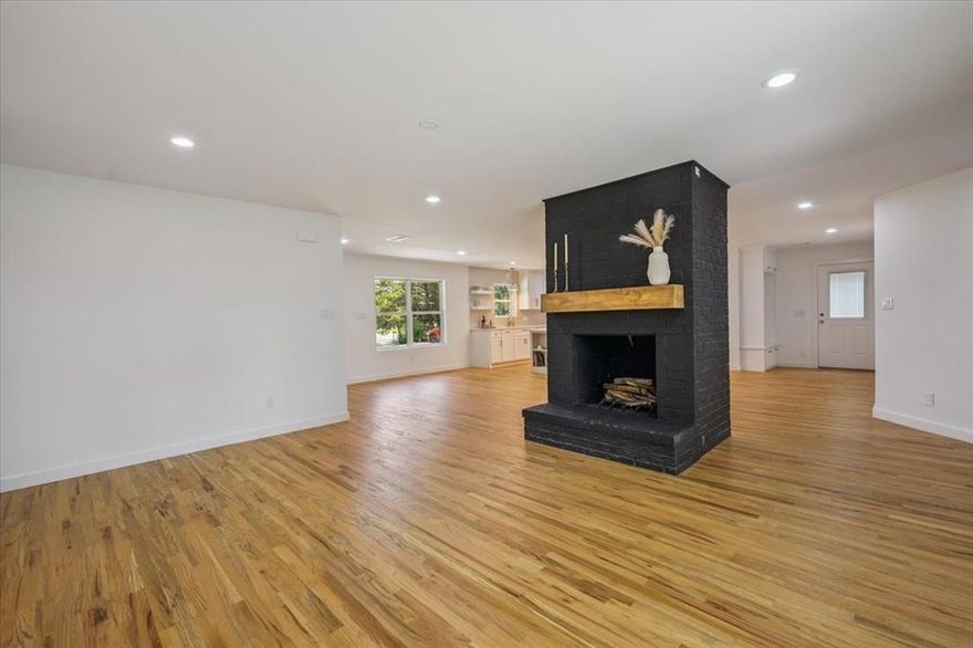 Exquisite Country living House!!!! If you are looking for a peaceful and private acres property. Where you can grow up with your family. Here is an amazing opportunity to own this home with a fantastic location on E Hwy 56 in Bonham TX a complete remodel, beautiful real estate sitting on 3.221 acres with a pound. 
Featuring 4 bedrooms, 3 full bathrooms, and an open-concept layout, the home includes a gourmet kitchen, and large windows for natural light throughout. The luxurious primary suite includes exquisite shower bath and walk-in closet. Enjoy both covered front and back porches, a cozy fireplace, and plenty of space to add a barn, garden, or workshop. Thoughtfully designed for comfort, privacy, and modern living perfect for living and entertaining. Fireplace with a wood log to enjoy a family cozy winter night, spacious rooms, and laundry room. This is a very unique property for potential guest house, barn, stable, or anything that you can dream of. This beautiful, charming, peaceful property is full of trees in the back with access to your pound. Amazing location within 4 minutes to Historical downtown Bonham TX in Fannin County.  Do NOT miss the opportunity to own this wonderful property with many amenities, ready to enjoy the country living, and many advantages to build your lifestyle needs. MUST SEE!