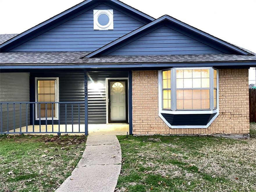 Charming 3-bedroom 2 full bath home nestled on a corner lot and has fabulous curb appeal with circular front drive! Recent updates - fresh paint, replaced flooring, furnace installed 2024, lighting, roof replaced December 2024 and more. Living area features a cozy brick fireplace. Garage converted into 2nd living or could be home office! Open kitchen offers built-in microwave, dishwasher, disposal and oven with separate cooktop. Split bedroom design. Huge backyard with oversized patio. Within walking distance of schools!