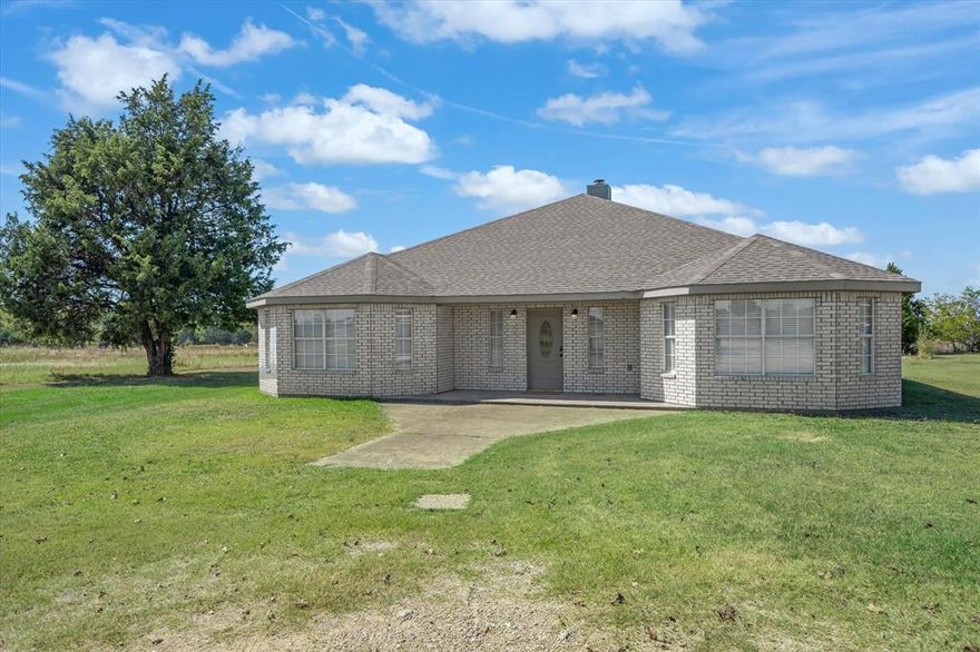 Peaceful Country Living on 5 Acres – Updated 4 Bedroom Home in Mabank!
Escape to the country with this beautiful 4 bed, 2 bath brick home nestled on 5 acres of open land. Built in 2006 and updated with modern finishes, this 2,648 sq ft home offers the perfect blend of comfort and rural charm.  Step inside to find an inviting open-concept layout with a spacious living area, stone fireplace, and bright natural light throughout. The kitchen features granite countertops, stainless steel appliances, and plenty of cabinet space. The primary suite includes a luxurious bath with dual glass vessel sinks, tiled shower, and soaking tub.
Upstairs offers an additional 200 sq ft of living space perfect for a game room, office, or guest area. Outside, enjoy a private drive, fenced acreage, mature trees, and wide-open views—ideal for horses, livestock, or gardening.  Approx. 41' x 41' pole barn with concrete flooring that could be converted into a four car detached garage.  Located just minutes from town yet tucked away for privacy, this property offers the best of both worlds: modern living surrounded by nature.
Need more land?  Adjacent 15 acres is also listed- MLS #21078608 
Realtor is the owner of this property.