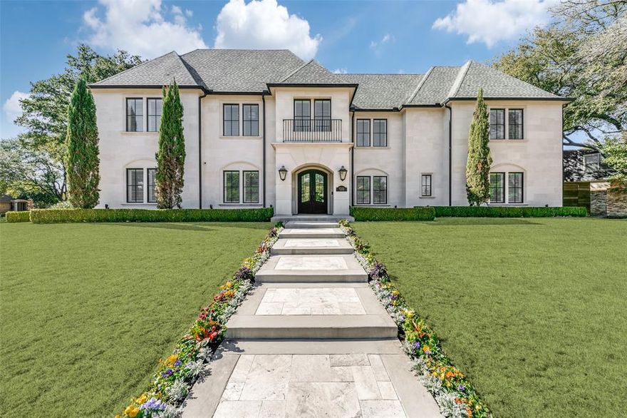 A unique custom home with exquisite attention to detail, located on a private street. This home is finished with the finest materials, including Italian marble flooring, intricate trim work, custom iron doors, and stunning lighting fixtures. The kitchen boasts top-of-the-line features with Calacatta and Cristallo quartzite countertops. The master bath features quartzite counters, a mosaic tile wall, heated floors, a large walk-in shower, and a freestanding tub. Perfect for entertaining, the home includes a crescent-shaped bar, wine closet, a large game room, and a media room. Outside, there's a covered patio with a grill and a pool. Attached quarters with a separate entry add to the amenities of this home. Additional special features include a Control 4 system, an oversized garage, and landscaping that fully utilizes the 0.54-acre lot.