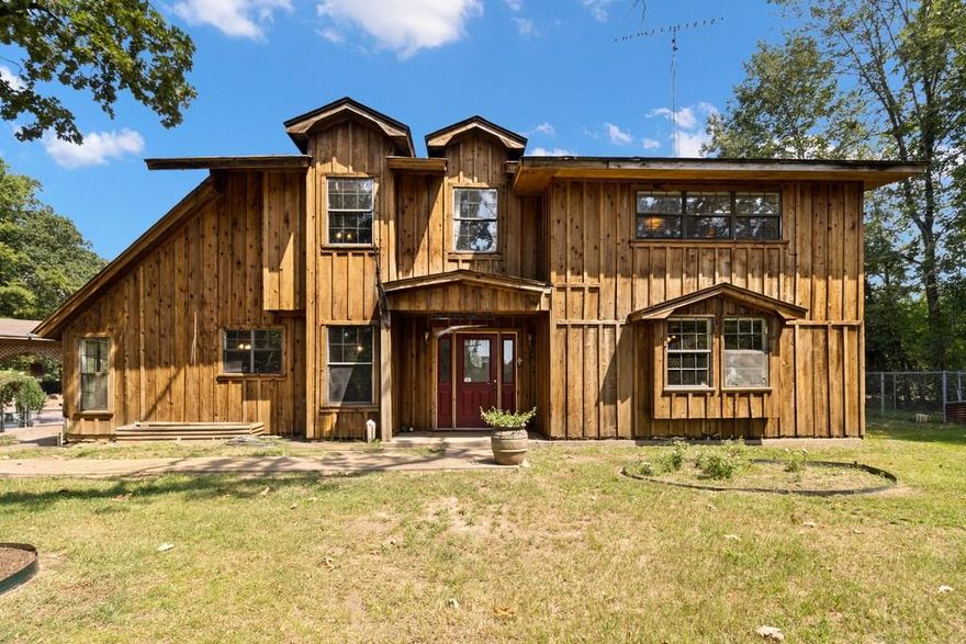 Welcome to one of the most unique and versatile properties in Texas! Situated on 7.5 acres, this exceptional estate offers everything you could dream of and more. The centerpiece is a 4-bedroom, 3.5-bath main home with spacious rooms throughout, perfect for family living or entertaining. 
Above the large horse barn, you'll find a charming 1-bedroom, 1-bath apartment, ideal for guests, staff, or extra income potential. Adjacent to the home, you’ll step into a piece of history with a classic old saloon, complete with a pool hall, bathroom, and a cozy bunkhouse. It’s a fantastic space for gatherings, parties, or simply stepping back in time. The saloon is complemented by a smokehouse and a large workshop, giving you even more opportunities for hobbies, storage, or projects.
For the equestrian enthusiast, this property is a dream come true. The large horse barn, training corral, and horse wash provide everything needed for horse care and training. It’s the ideal setup for a professional horse training facility or simply a place to nurture and enjoy your horses.
As you enter the property, you’ll be transported to the Wild West with a full replica of Tombstone’s iconic town front. This remarkable feature adds an unmistakable charm to the property, making it a perfect backdrop for events or photoshoots.
The property’s long driveway and heavily wooded borders provide a sense of seclusion, while still being conveniently located. The tranquil, private setting makes it ideal for a residential retreat, multi-family living, or even as an AirBNB or special event venue.
Relax and unwind under the shaded gazebo, surrounded by nature’s beauty. With its vast possibilities and unique features, this property is an investment opportunity like no other. Plus, you can even negotiate some of the furnishings to make it truly your own. Don’t miss your chance to own this extraordinary piece of Texas!