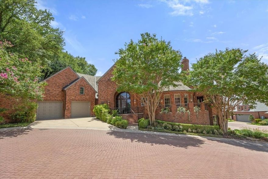 Located close to TCU in the highly desirable, gated Westbriar neighborhood in Overton woods, this stunning home was custom built in 2007 by Westbriar Construction. The residence offers the perfect combination of elegance, functionality, & comfort. The thoughtfully designed layout begins with a spacious formal dining room & a welcoming living room, complete with a cozy fireplace & built-in bookcases. The inviting family room, also featuring a fireplace & custom built-ins, flows seamlessly into the gourmet kitchen, which boasts a 4-burner gas cooktop with griddle, double ovens, warming drawer, large island, & roomy breakfast area. Perfect for entertaining, the home includes a wet bar & generous walk-in pantry.  The loggia, off the family room, has a fireplace, automated screens, wiring for a TV  & ceiling fan making it a great extension of the homes living space. The primary suite has private access to the side yard, features a spa-like bathroom with double vanities, a classic clawfoot tub, walk-in shower, and his and her closets. A second bedroom with an ensuite bath and walk-in closet is located at the opposite end of the first floor for added privacy. Additional main-level highlights include a private office and well-appointed laundry room. The lower level is equally impressive, offering a cozy room with a bar and  fireplace, making it an ideal movie room. The downstairs library with exposed brick overlooking the neighborhood has a separate entrance and is close to community parking making it the perfect home office. The third bedroom features an ensuite bath and walk in closet. Additional amenities include a two-car garage, a home automation system, climate-controlled storage and exceptional floored attic storage with easy access. The sprinkler system and main level thermostats can be controlled remotely using an app. Blending timeless craftsmanship with modern conveniences, this home is an exceptional opportunity in one of the area’s most coveted communities.
